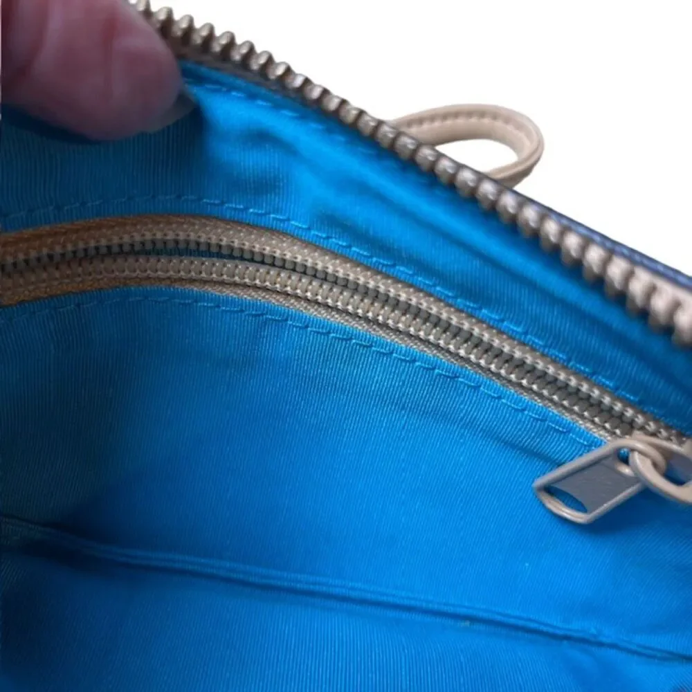 Parazul Wristlet Black with Tan. Gold Hardware Blue interior‎